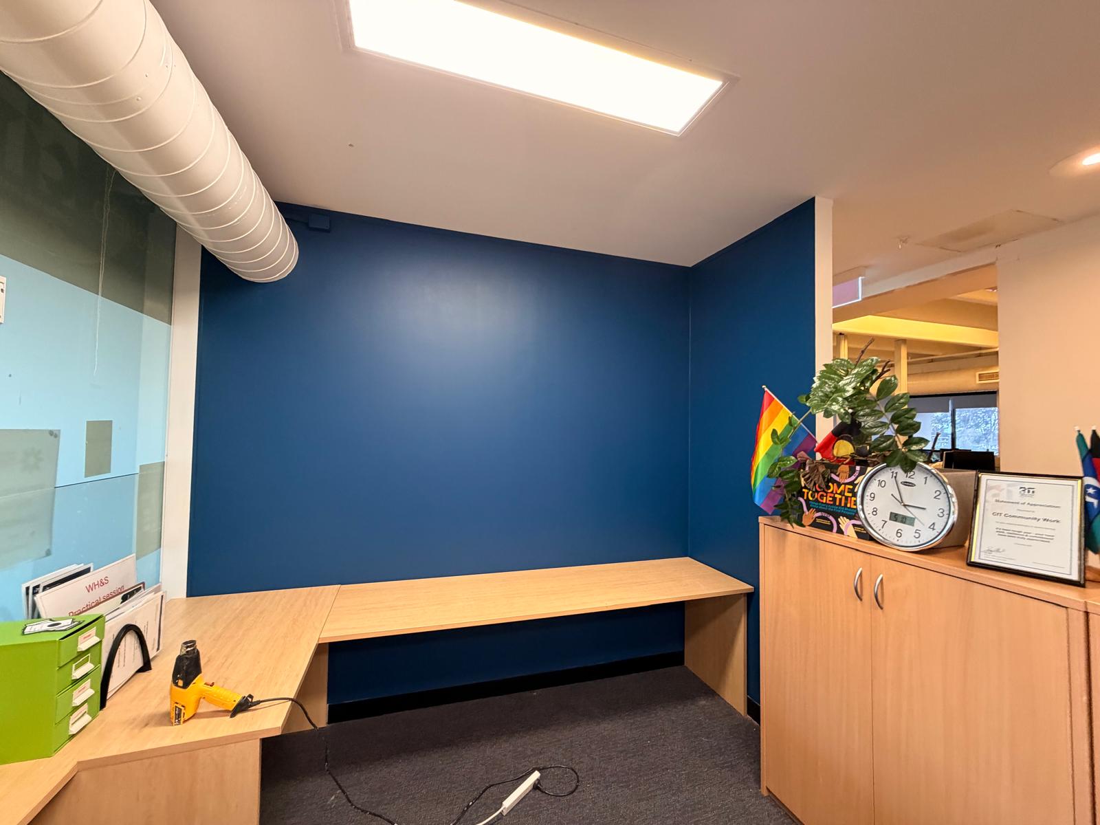 Vibrant feature wall bringing a fresh, welcoming feel to a Canberra childcare centre