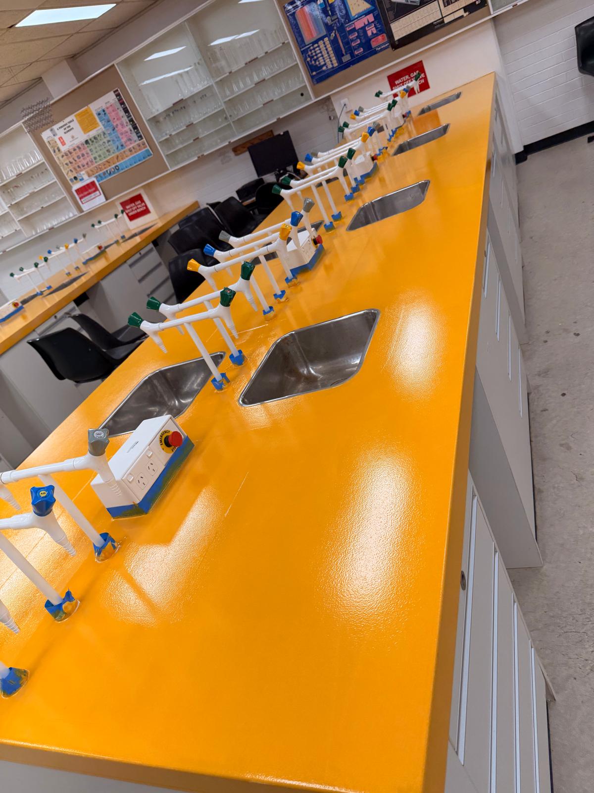 Durable epoxy finish across a full row of laboratory benches