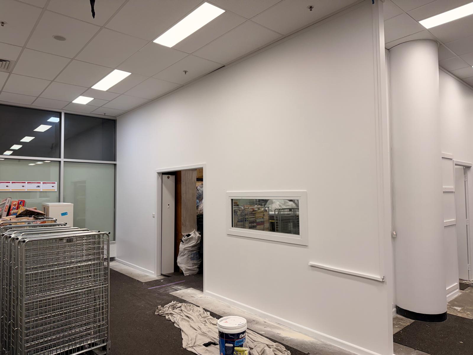 Crisp white walls finished throughout the retail space
